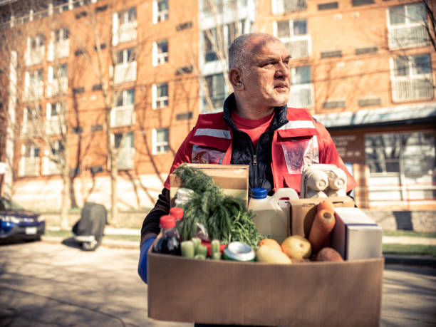 istock COVID-19, Donation Home food delivery during lockdown 1220150811