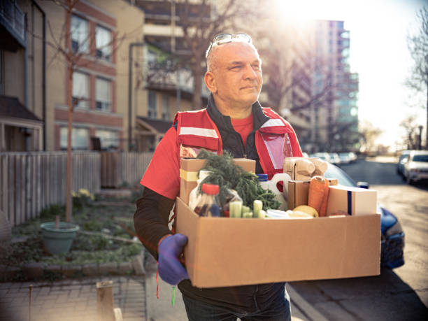 istock COVID-19, Donation Home food delivery during lockdown 1220150926