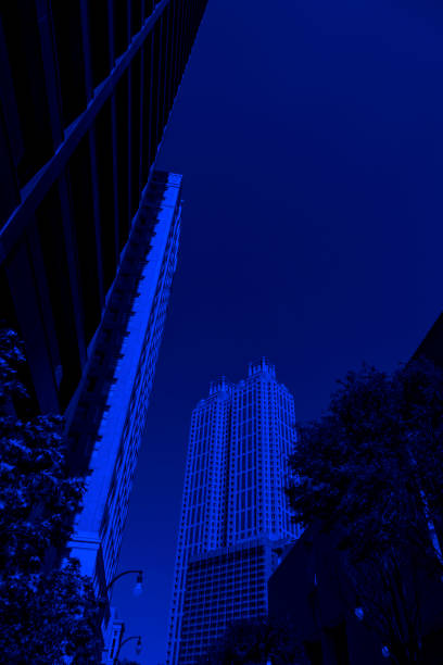 Low angle view of Atlanta downtown tall office building exterior at night
