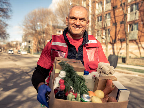 istock COVID-19, Donation Home food delivery during lockdown 1220151391