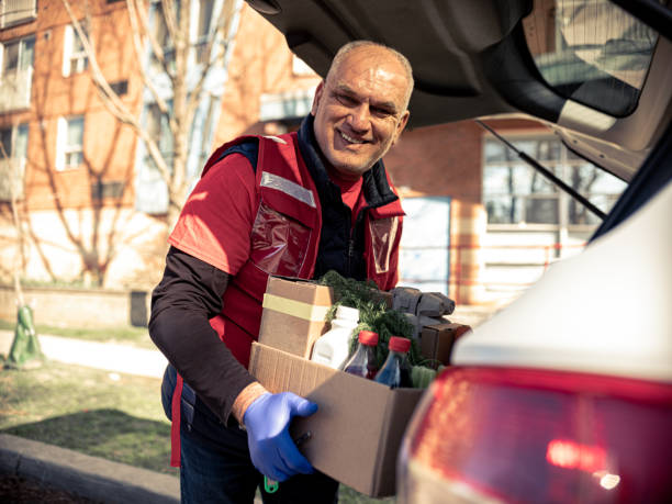 istock COVID-19, Donation Home food delivery during lockdown 1220151504