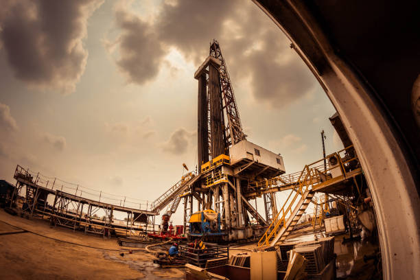Oil Drilling onshore rig Petroleum oil and gas company drill in to the reservoir rock for discovery fuel. natural gas extraction stock pictures, royalty-free photos & images
