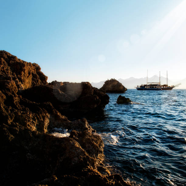 istock large group of people on sailing boat over sunny sky 1220152745