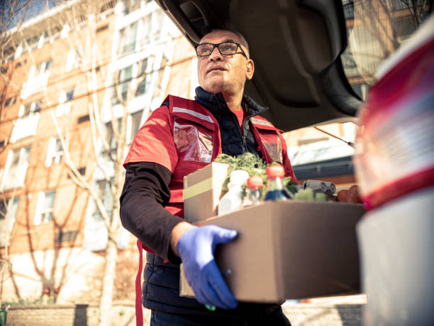 istock COVID-19, Donation Home food delivery during lockdown 1220152880