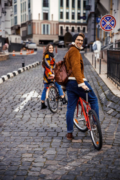 istock Two young cyclers ready for long city trip stock photo 1220152903