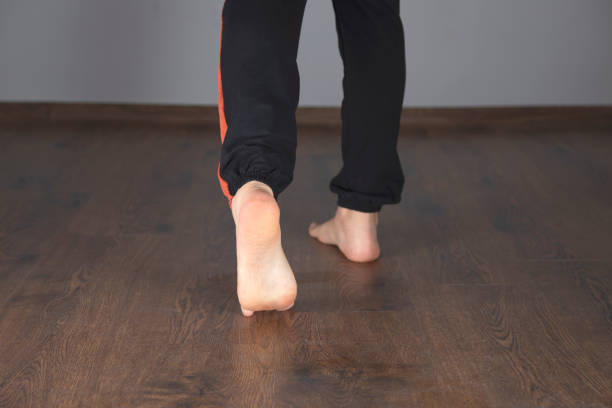 istock walking barefoot in the house 1220154806