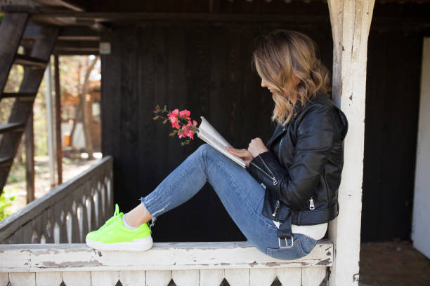 istock Girl only with flowers 1220155957