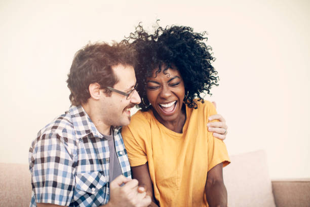 istock Happy couple having fun at home 1220156214