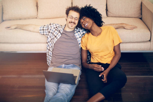 istock Happy couple having fun at home 1220156270