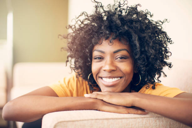 istock Happy young woman having fun at home 1220156716