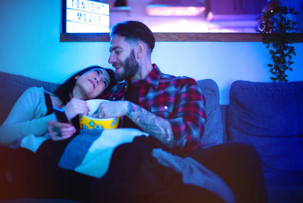 istock Couple Watching Movie 1220157074
