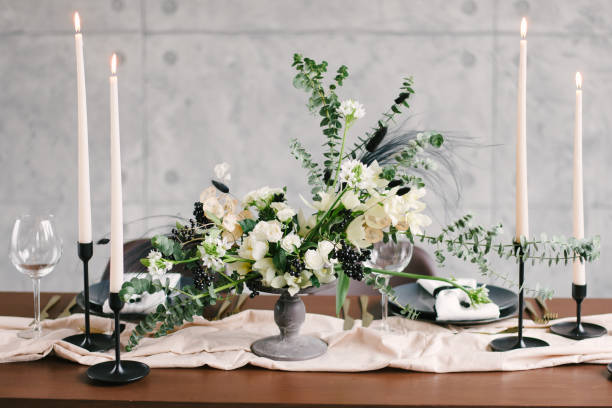 istock Table setting at a luxury wedding and Beautiful flowers in a vase on the table. 1220157139