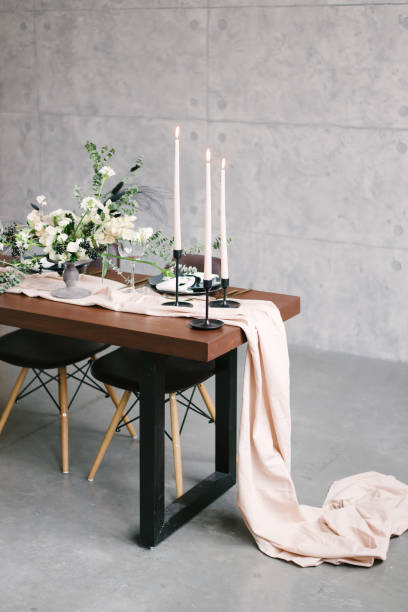 istock Table setting at a luxury wedding and Beautiful flowers in a vase on the table. 1220157765