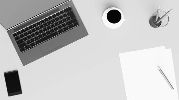 istock Laptop, smartphone, pens, paper and a cup of coffee 1220157796