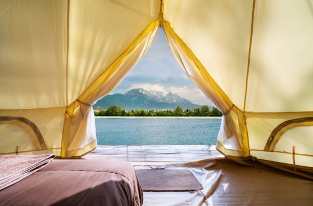 Camping and tent in the mountains near of the lake.