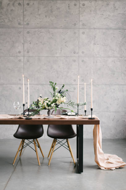istock Table setting at a luxury wedding and Beautiful flowers in a vase on the table. 1220158579