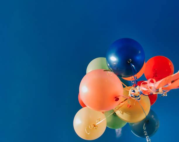 istock balloons in the sky directly from below 1220160218