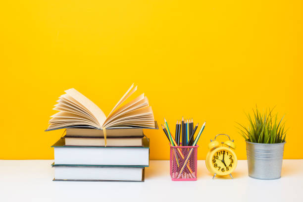 istock School equipment on yellow background, Education background concept 1220160885