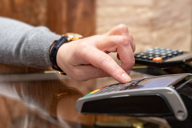 istock Payment by card, in the payment terminal. Electronic money. Mobile banking. Shopping complex. 1220162123