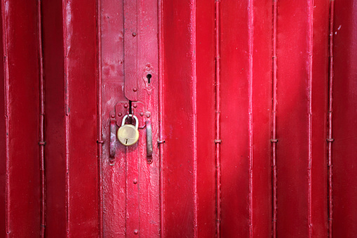 Red coloured shutter with a lock