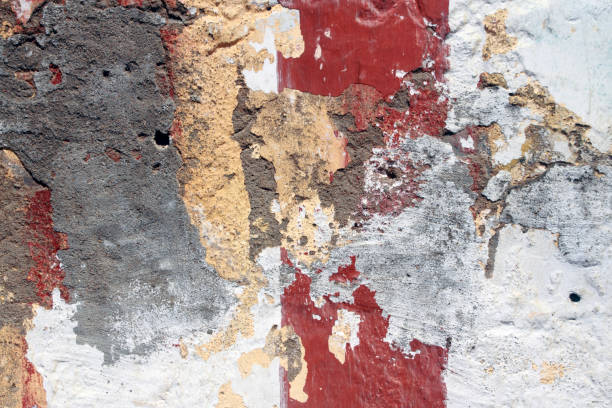 istock Paints peeled off from an old wall 1220165220
