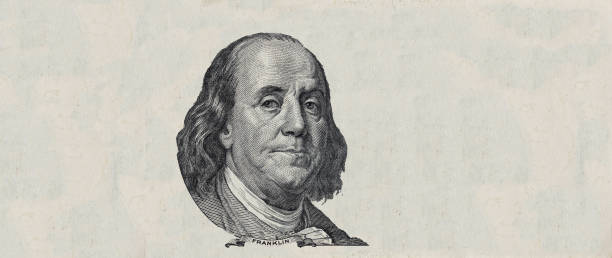 istock Benjamin Franklin cut on old 100 dollars banknote isolated on white background 1220168861
