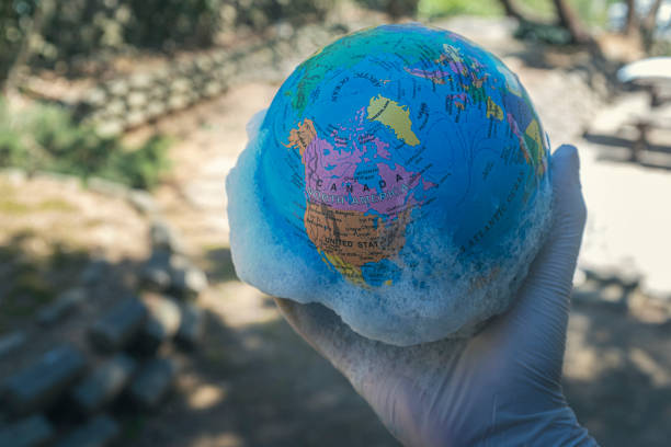 istock Water pouring on planet earth 1220169526