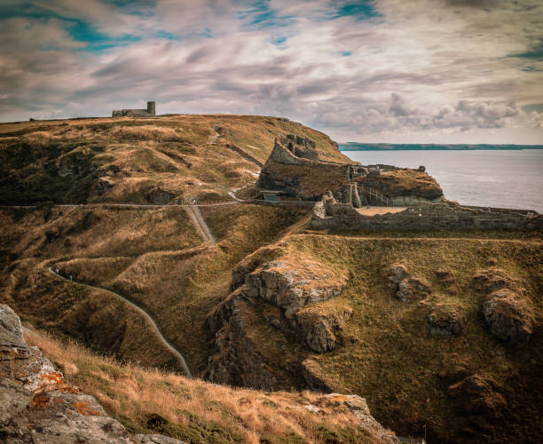 Tintangel, North Cornwall, England - July 24,2018: Tintagel Castle. Linked with the legend of King Arthur, and next to the cave where Magician Merlin lived.