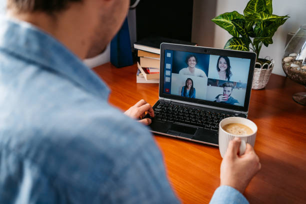 istock Man having a video call with friends 1220170097