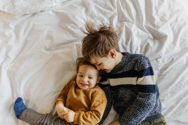 istock Little boys having fun at home 1220170784
