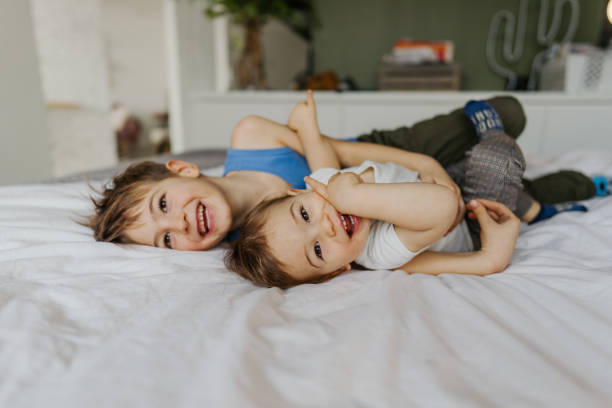 istock Little boys having fun at home 1220170852