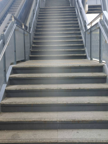 istock Architecture construction of elevator, escalator stairs and sky walk way, walk bridge between sky train station and shopping mall 1220170959