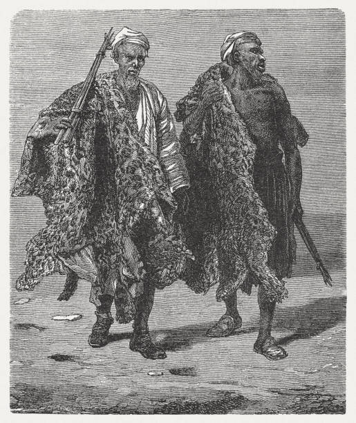Arabian fur traders, wood engraving, published in 1893 Arabian fur traders. Wood engraving, published in 1893. two men hunting stock illustrations