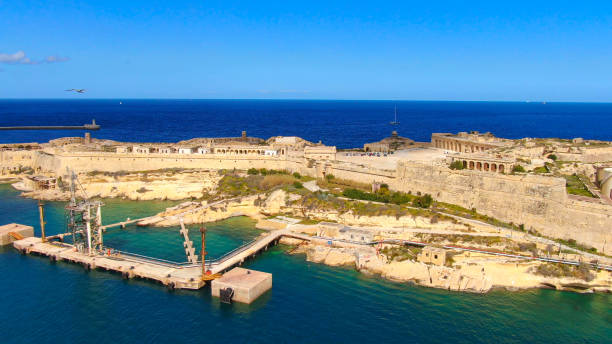 istock Beautiful Rinella Bay in Malta from above 1220173556