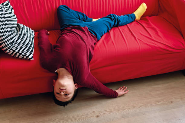 istock Bored child on living room. 1220175296
