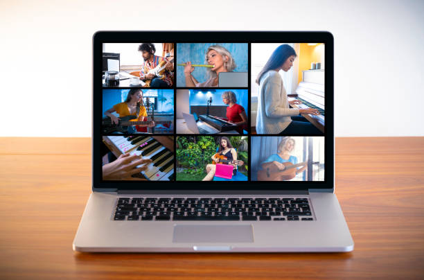 istock Music teleconference concept with laptop on wooden table 1220176065