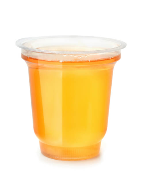 copo de plástico de sobremesa de geleia de frutas - gelatin dessert orange fruit marmalade - fotografias e filmes do acervo