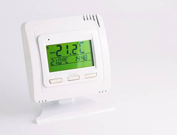 contrôleur de thermostat à distance - room temperature photos et images de collection