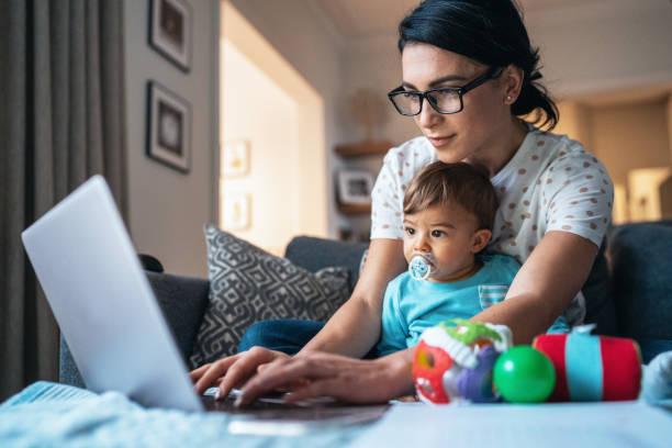 working at home mom - glasses child cute offspring imagens e fotografias de stock