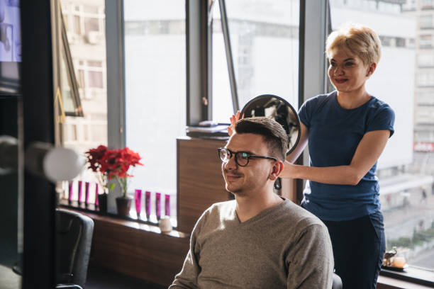 istock Happy customer in a hir salon 1220180014