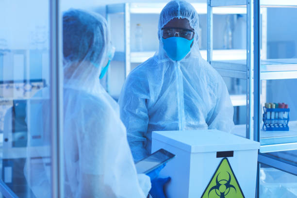 istock Chemists working with chemical wastes 1220182706