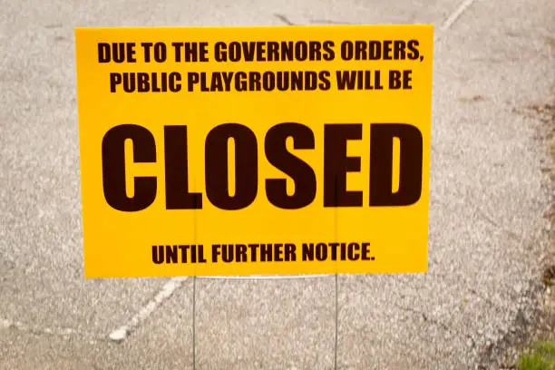 Public park closure sign posted in Ohio due to the Ohio Republican Governor orders given for a Statewide quarantine for corona virus risks
