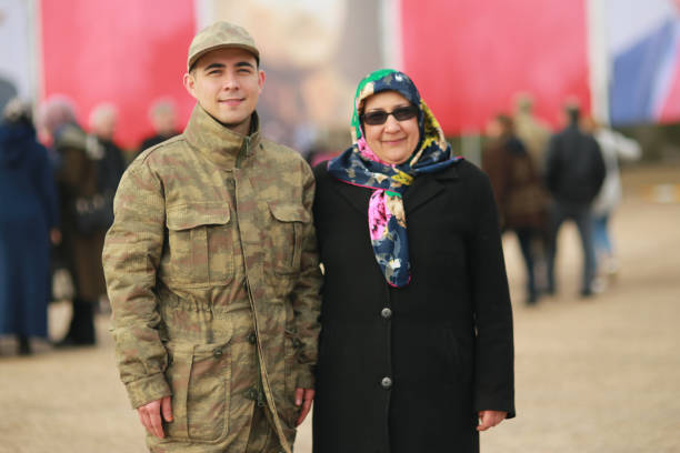 turkish soldier with his mother after the ceremony