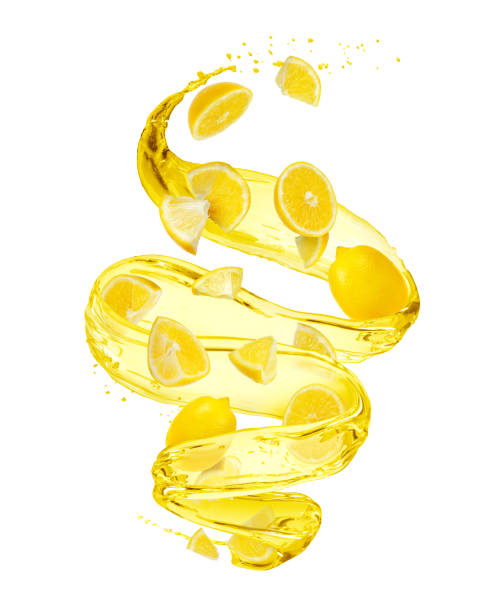 istock Lemon with splashes of juice in a swirling shape, isolated on white background 1220184430