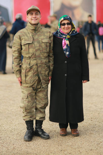 istock turkish soldier with his mother after the ceremony 1220184769