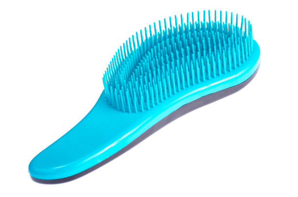 istock Blue comb for combing pet hair 1220186635
