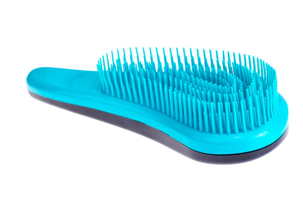 istock Blue comb for combing pet hair 1220186638