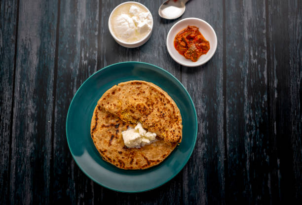 istock stuffed dal paratha with curd, pickle and white butter 1220187202