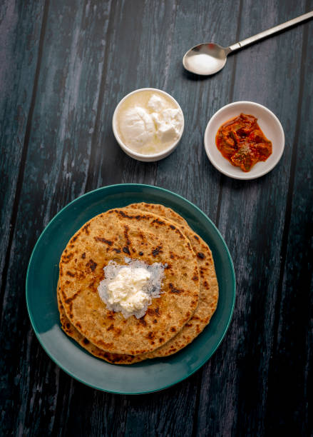 istock stuffed dal paratha with curd, pickle and white butter 1220187488