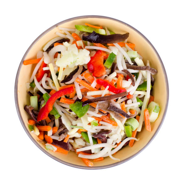 istock Mix vegetables with chinese mushrooms in bowl on light background 1220187704